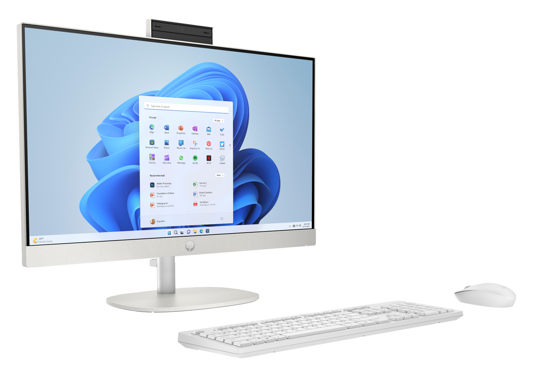 Biały komputer All-in-One z ekranem wyświetlającym interfejs Windows.