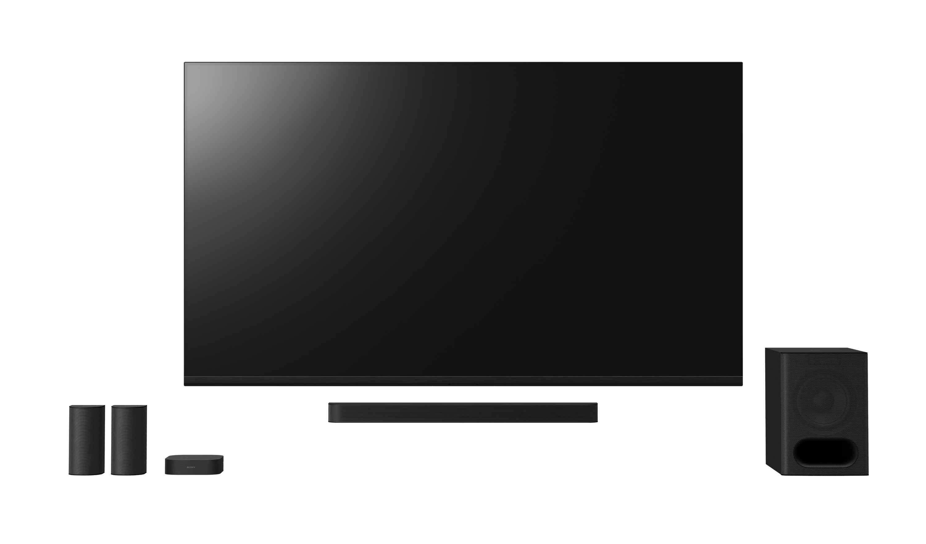 Großer schwarzer Fernseher mit Soundbar, Subwoofer und zwei Lautsprechern auf weißem Hintergrund.