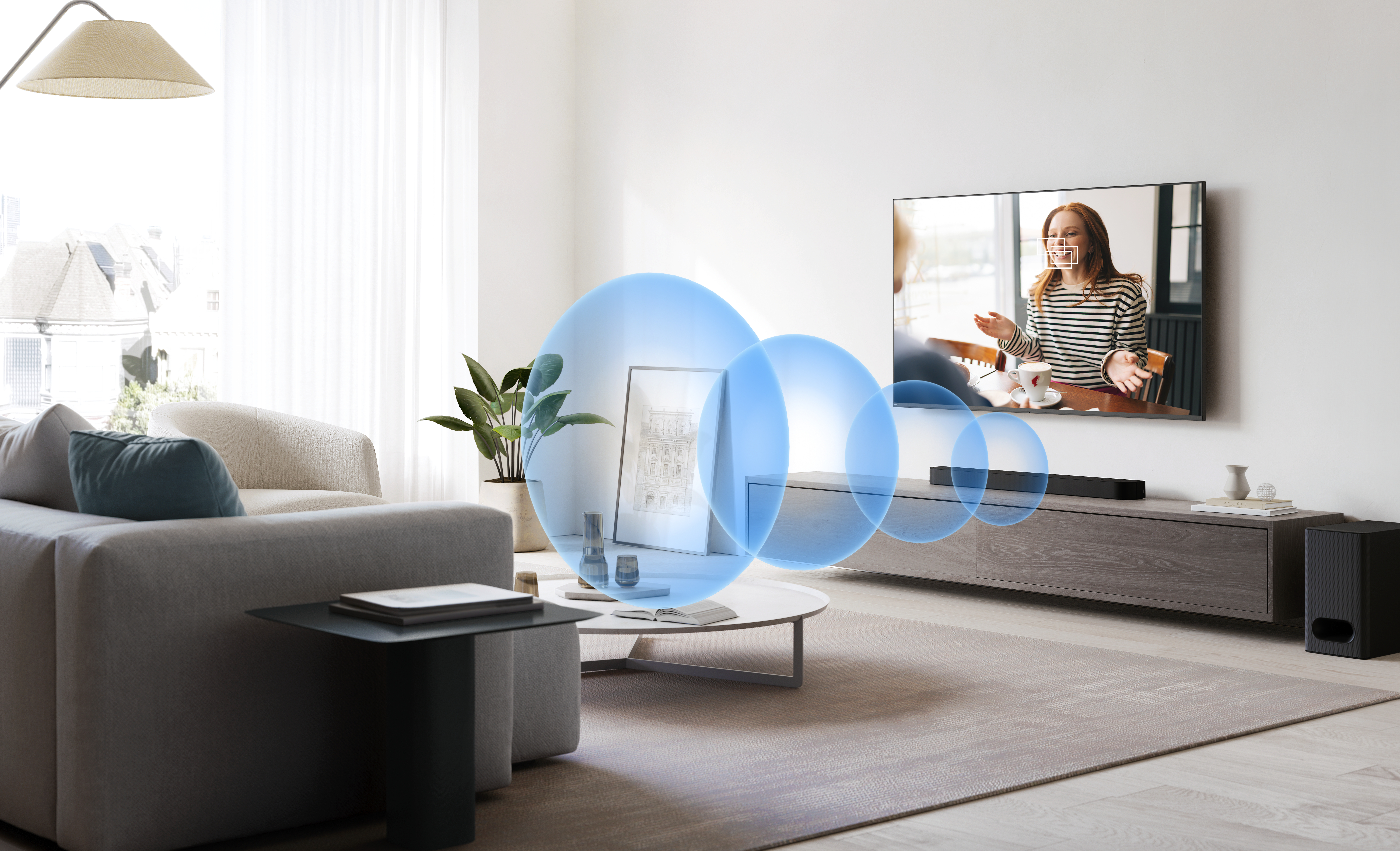 Wohnzimmer mit Fernseher, Soundbar und blauen Schallwellen.