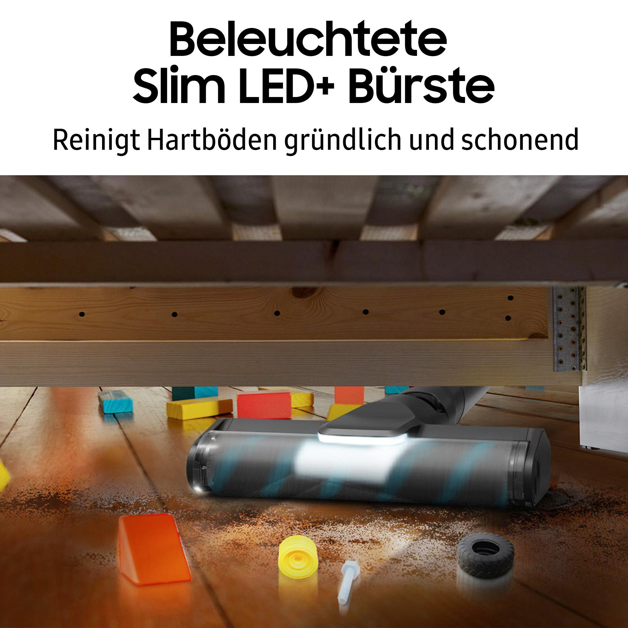 Ein Staubsaugerkopf reinigt einen Holzboden. Der Text lautet 'Beleuchtete Slim LED+ Bürste'.