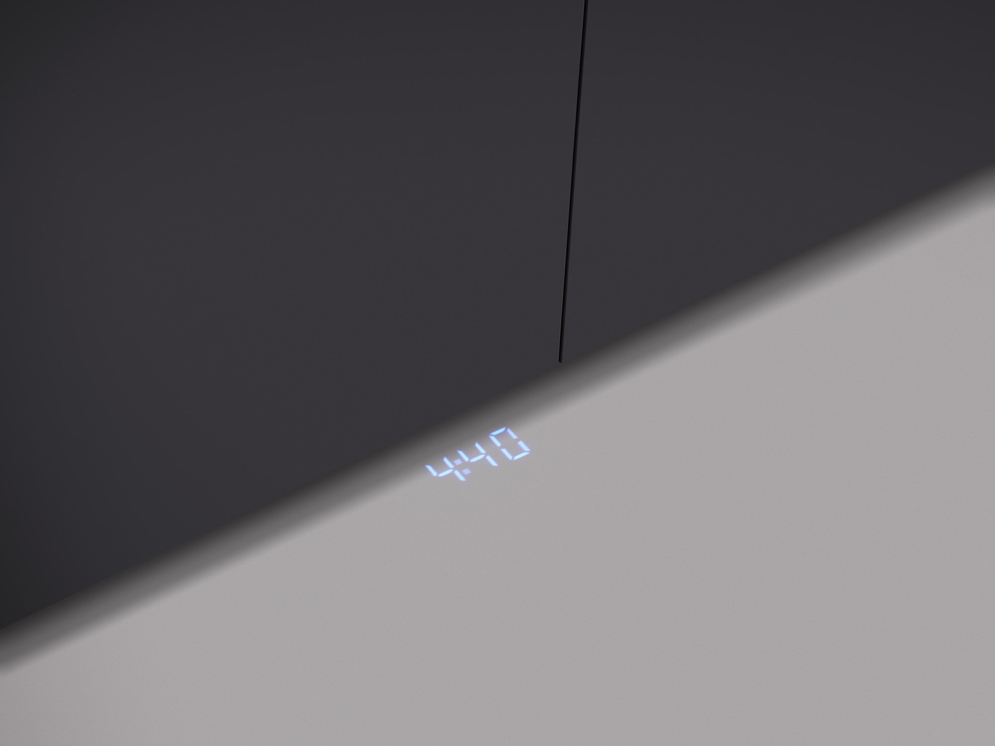 Eine digitale Anzeige mit "4:40" in Blau vor grauem Hintergrund.