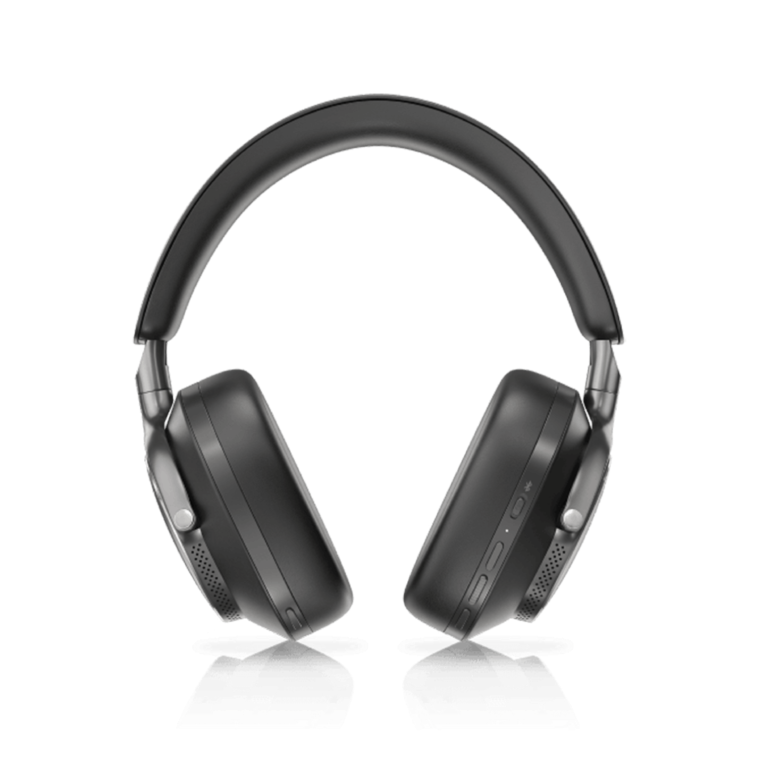 Auriculares negros aislados sobre superficie negra con reflejo.