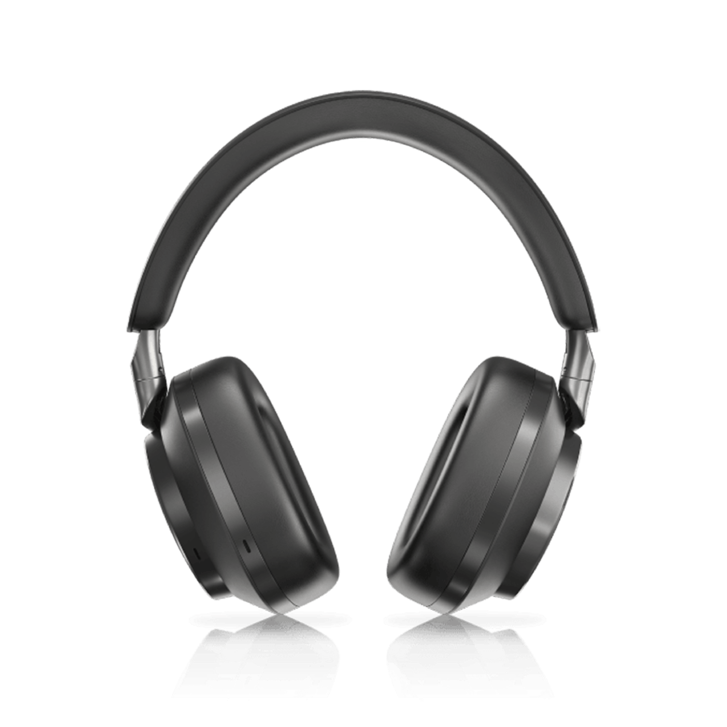 Auriculares negros aislados sobre una superficie negra.