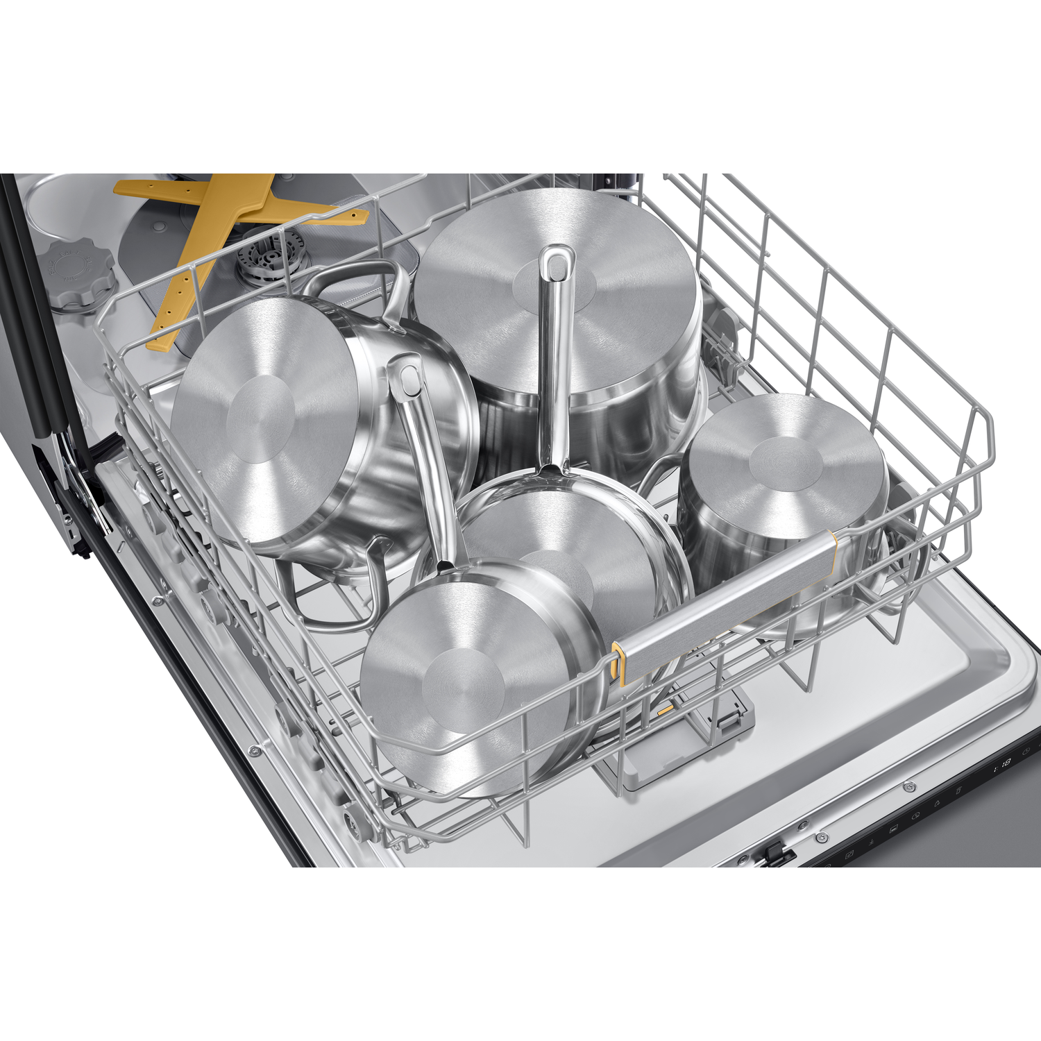 Stainless steel pots and pans inside a dishwasher. The door is open, showing the interior.