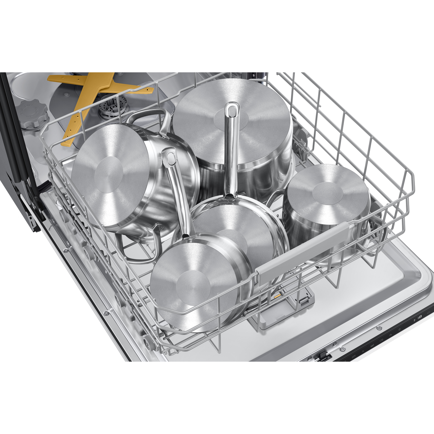 A dishwasher is open, filled with stainless steel pots, pans and other kitchen items. The interior is visible.