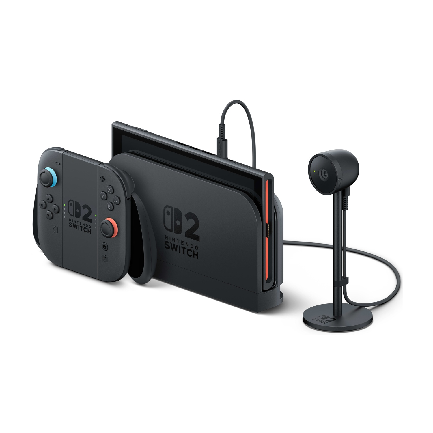 Una Nintendo Switch nera con controller e una fotocamera su sfondo bianco.