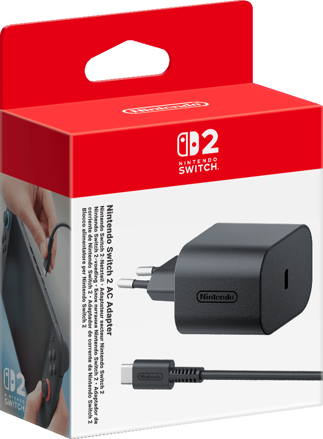 Una scatola con un caricabatterie Nintendo Switch e un adattatore CA, con la console Switch a lato.