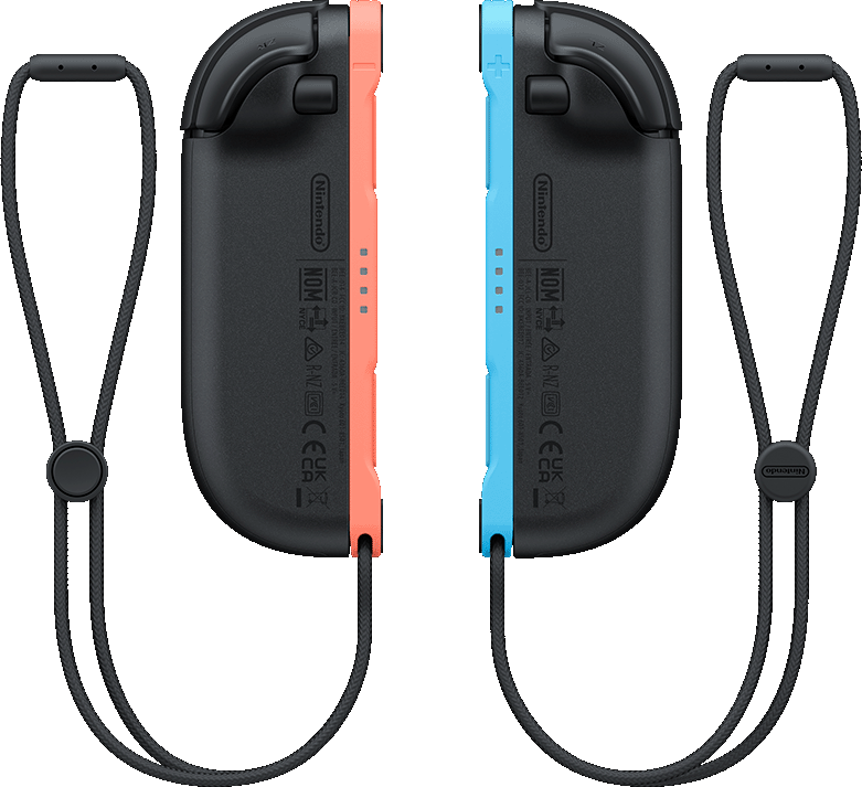 Deux manettes Joy-Con Nintendo Switch, une corail et une bleue, avec des dragonnes noires.