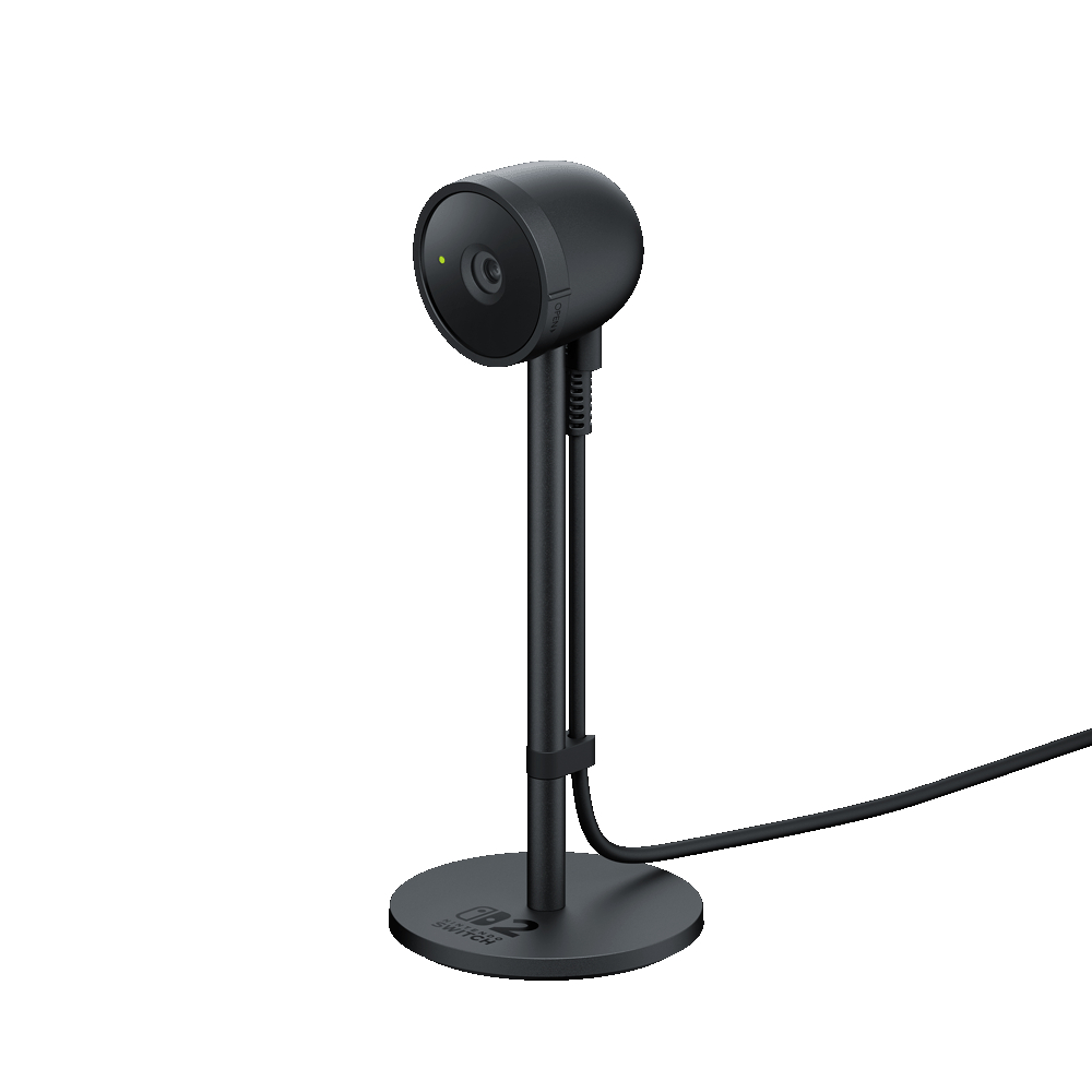 Eine schwarze Webcam auf einem Ständer. Sie ist rund mit sichtbarer Linse und mit einem Kabel verbunden.