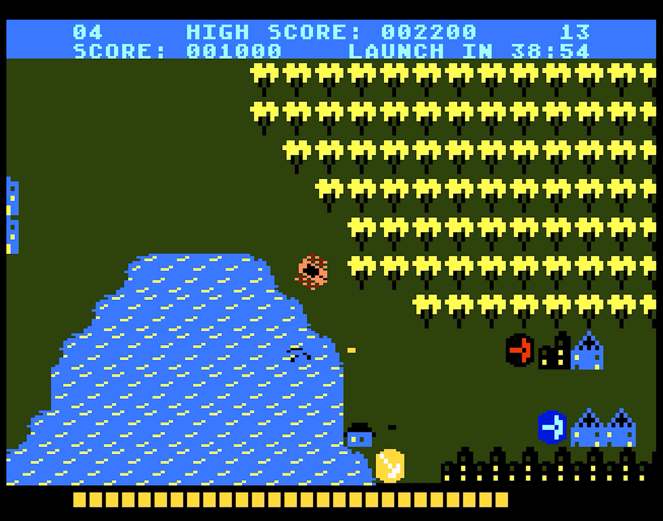 Ekran gry wideo retro z labiryntowym krajobrazem, postacią i wyświetlaczem wyniku.