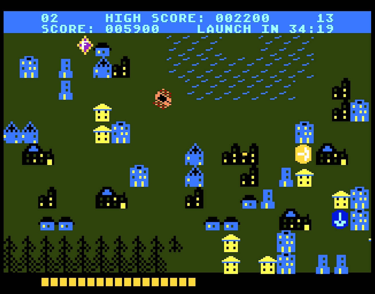 Ekran gry wideo w stylu retro. Pikselowa grafika przedstawia krajobraz z budynkami i latającym obiektem.