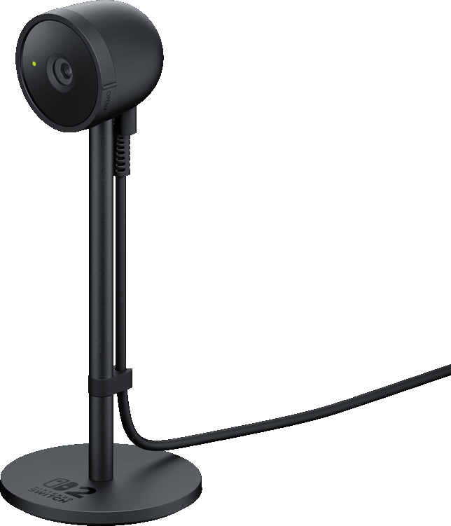 Una webcam nera su un supporto. La webcam ha una forma sferica con una lente. Il supporto è nero e rotondo.