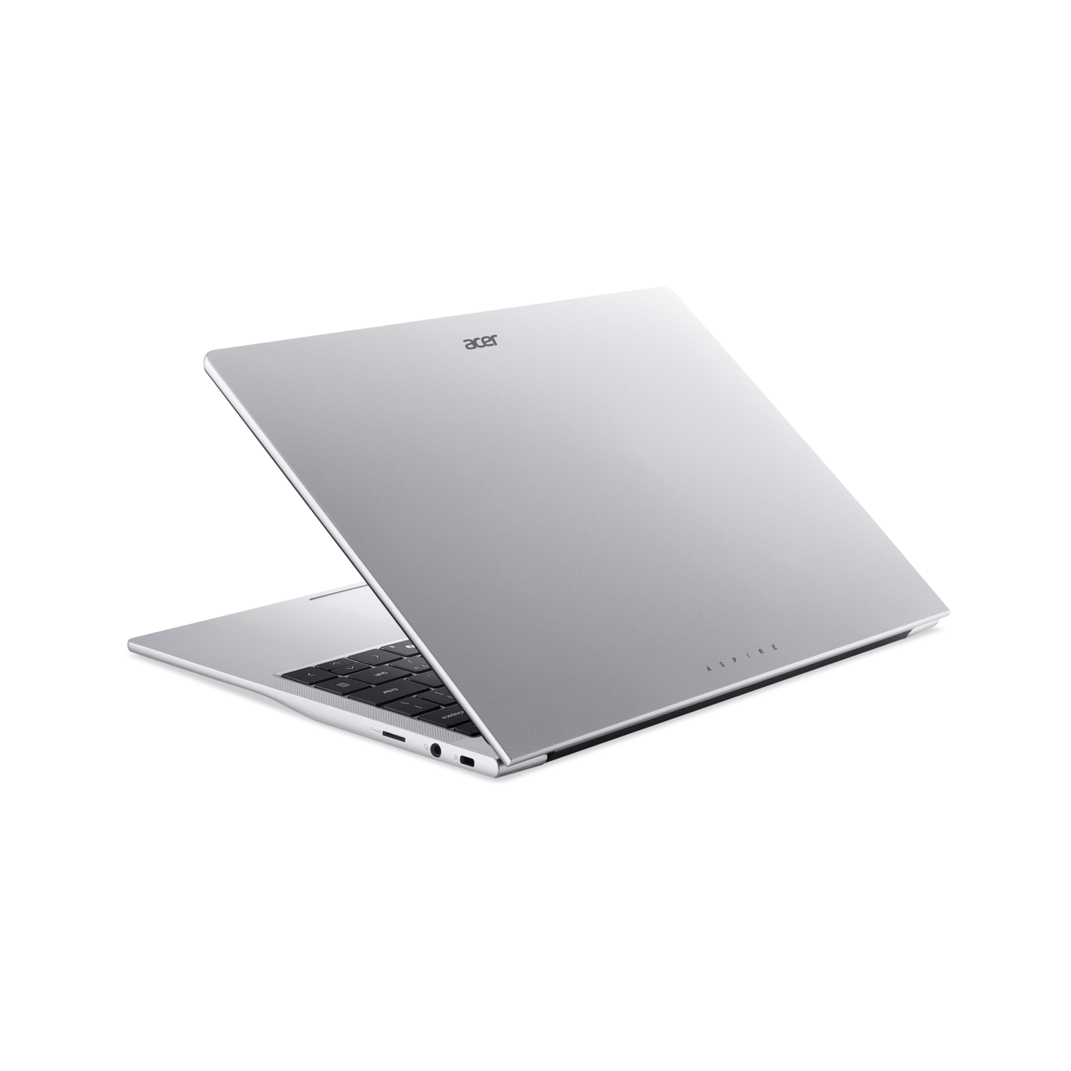 Een zilveren laptop, open, op een reflecterend oppervlak, Acer-logo zichtbaar.