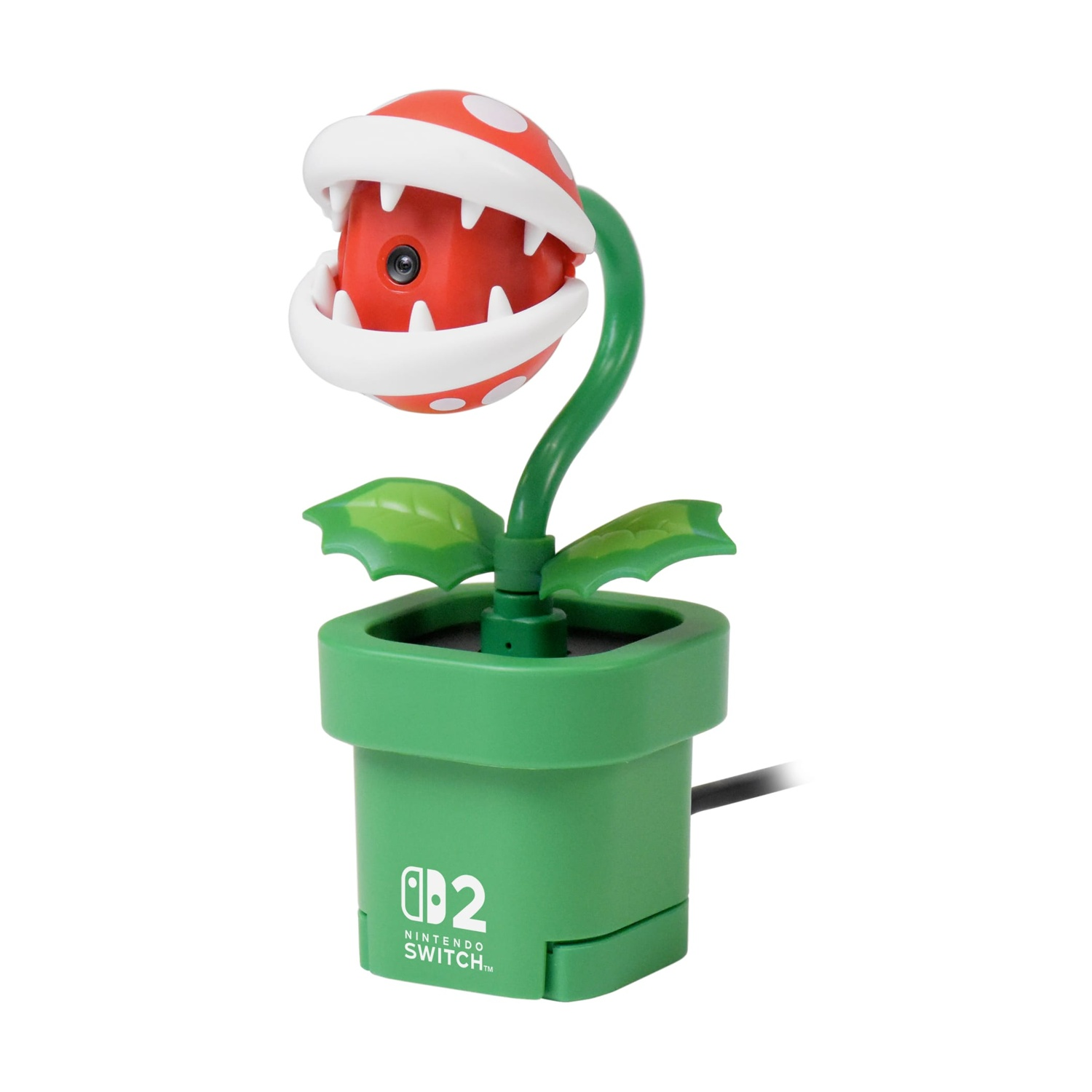 Webcam a pianta Piranha in un vaso verde. Testa rossa con pois bianchi e denti.
