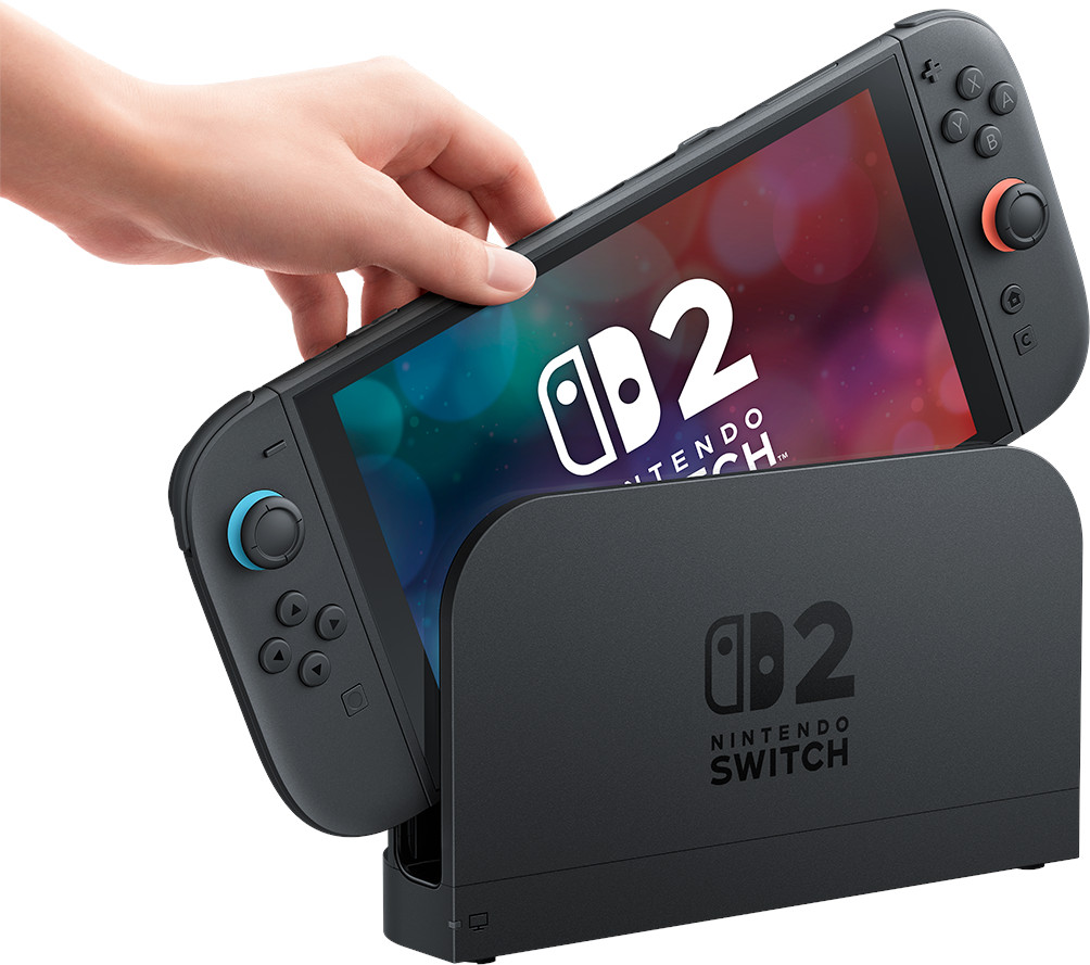 Hand plaatst een Nintendo Switch in het dockingstation.