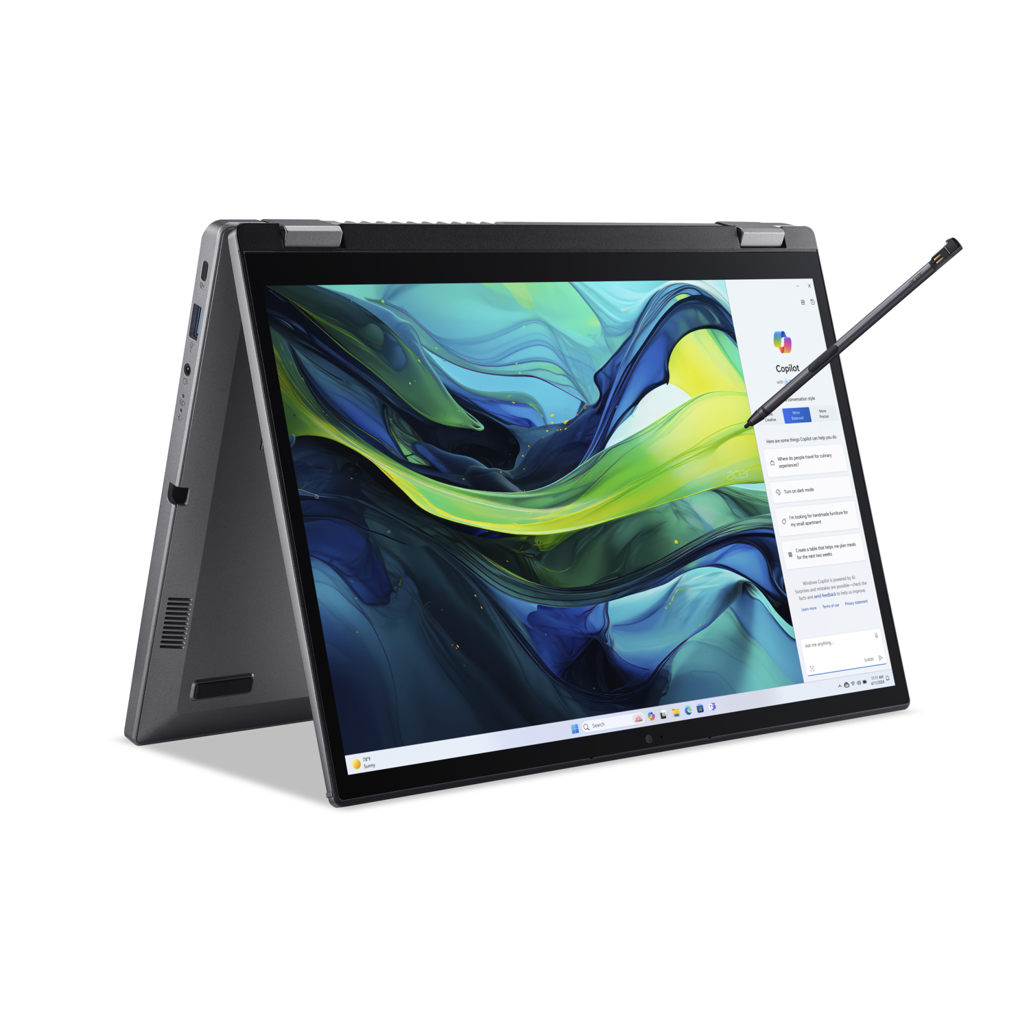Laptop open with stylus. The screen displays a digital art project with an open editing menu.