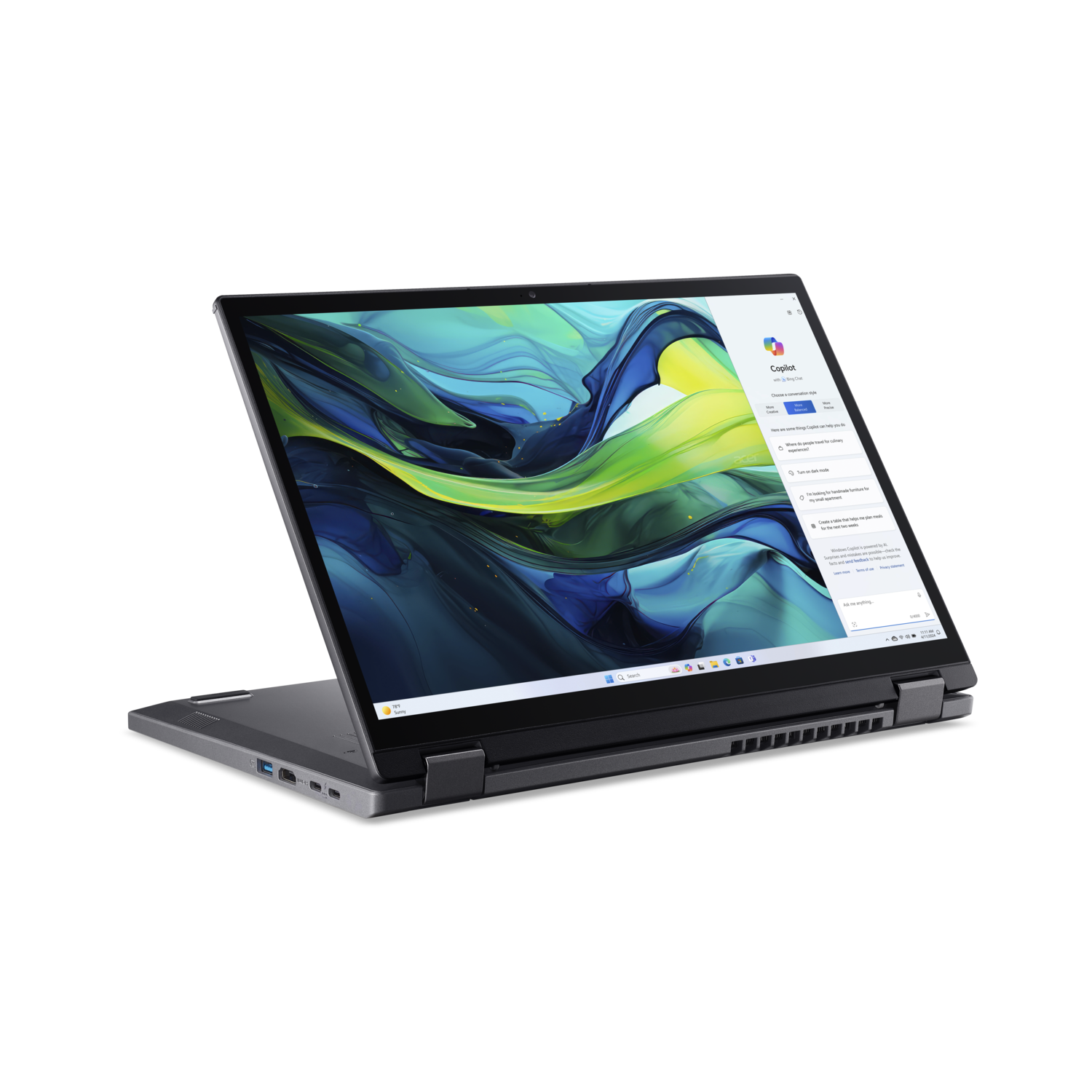 Acer laptop, open, display shows Windows Copilot interface. Laptop is on a black surface.