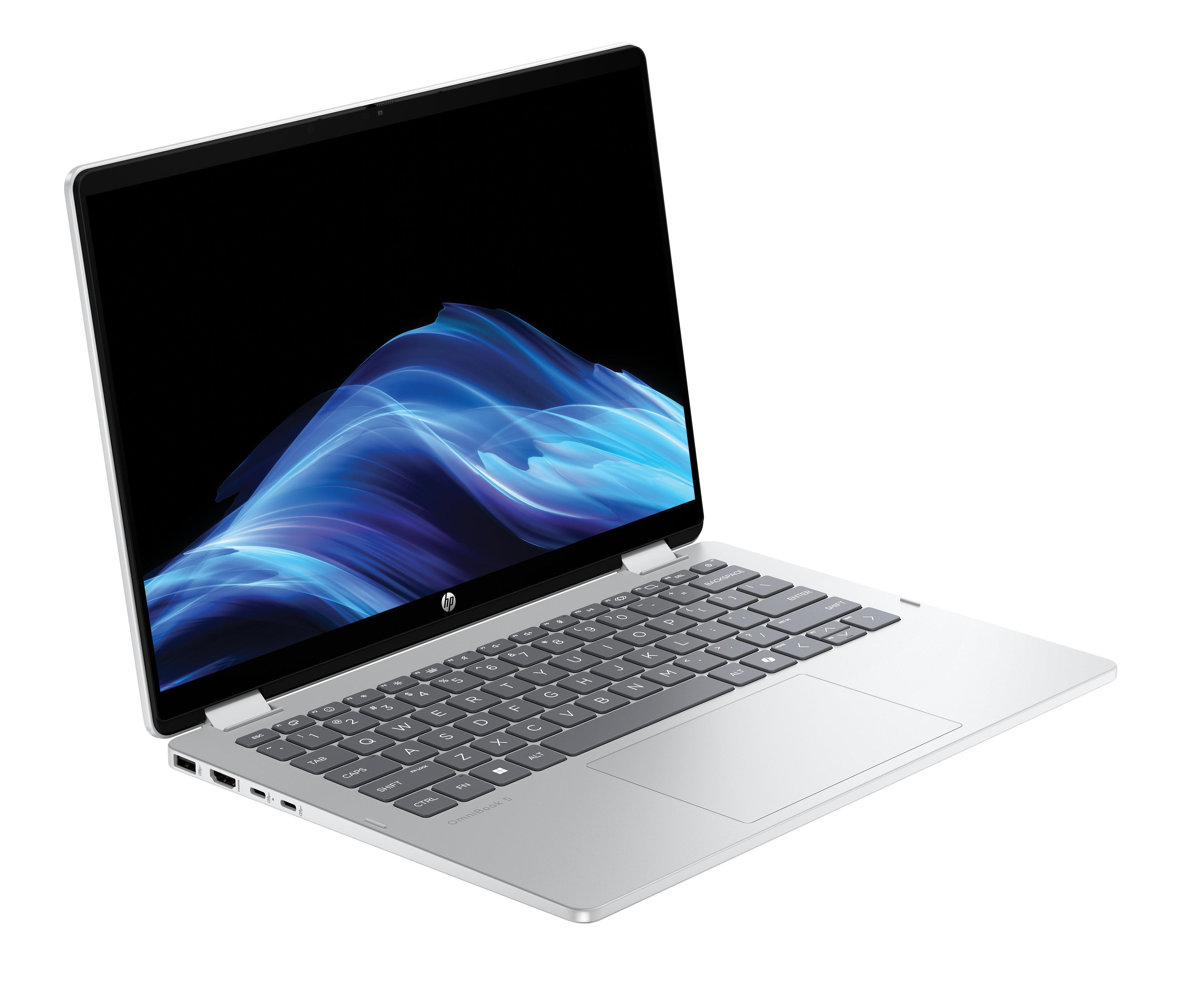 Ein silberner Laptop mit einem schwarzen Bildschirm, der blaue wellenförmige Muster zeigt. Er hat einen geöffneten Deckel.
