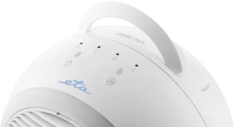 Fehér mini ventilátor fogantyúval és három vezérlőgombbal.
