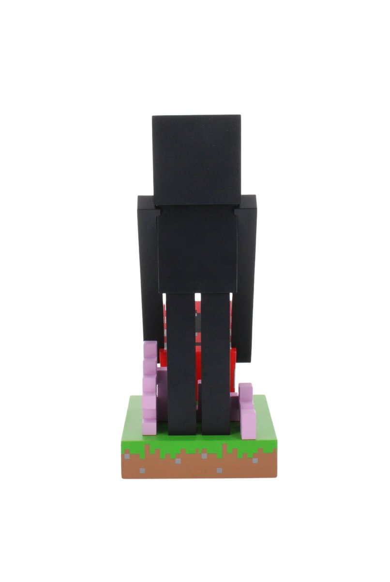 Eine Minecraft Enderman-Figur, die auf einer Basis aus Blöcken steht, mit weißem Hintergrund.