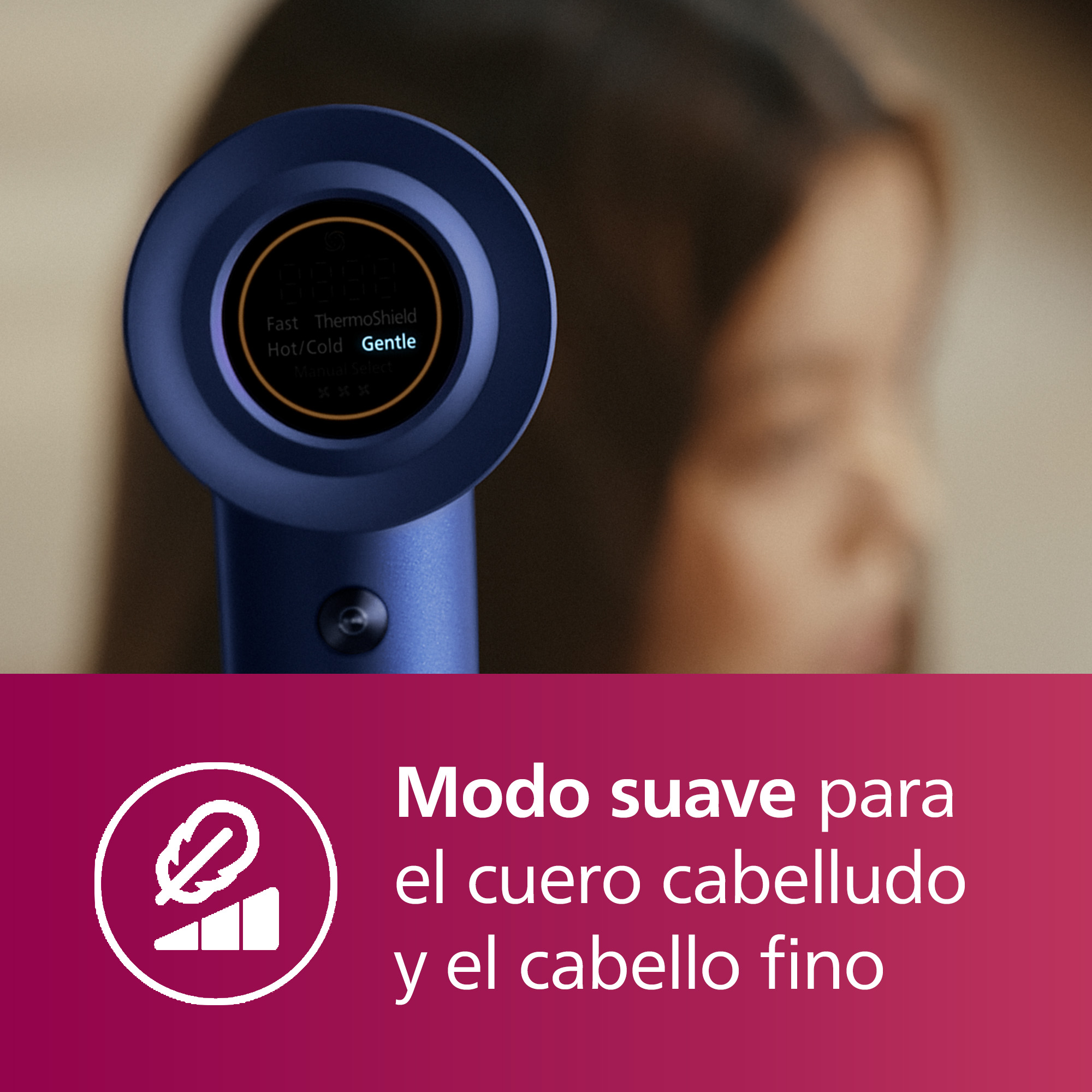 Un secador de pelo azul con pantalla que muestra ajustes. El texto dice Suave.