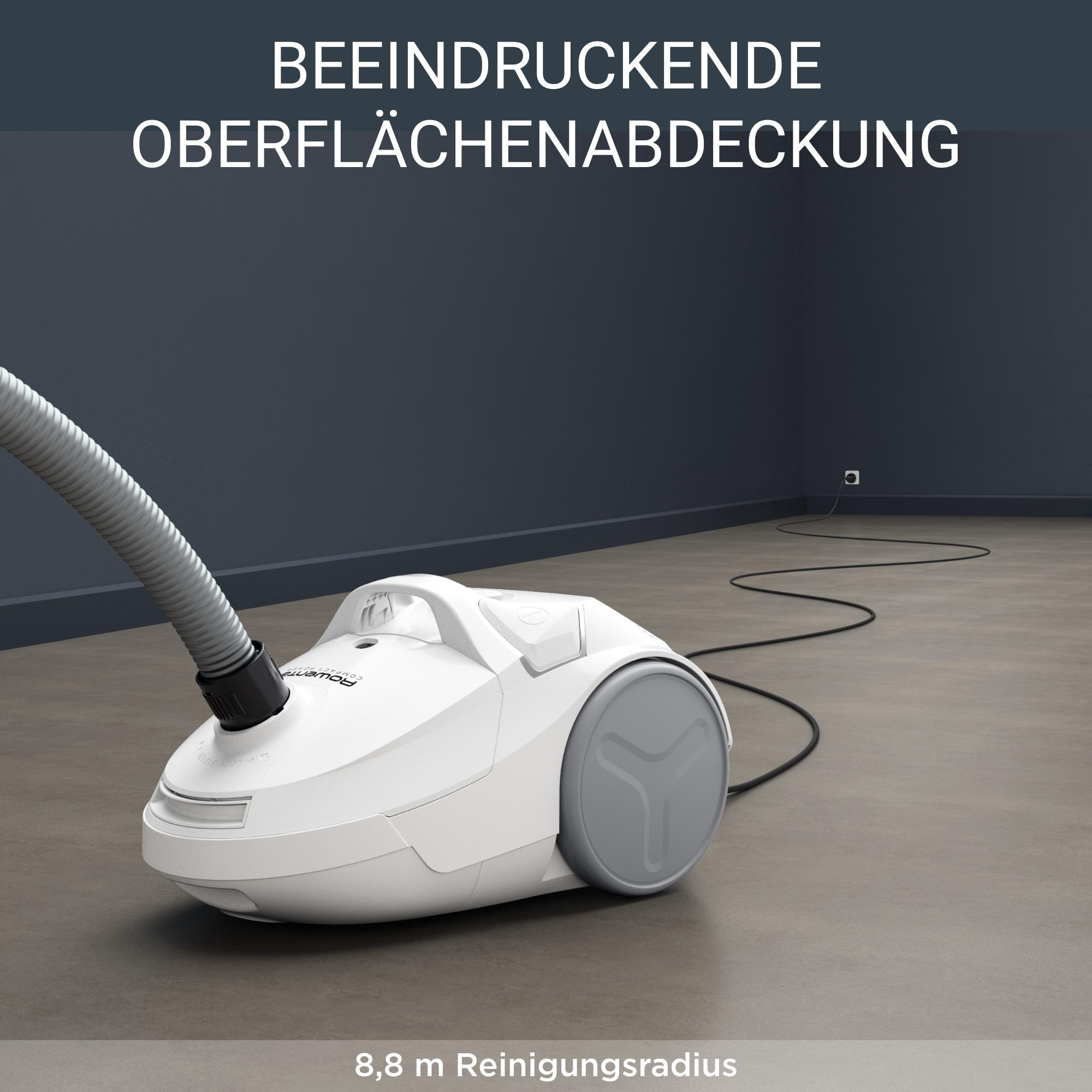 Ein weißer Staubsauger auf grauem Boden. Der Text oben lautet: Beeindruckende Oberflächenabdeckung.