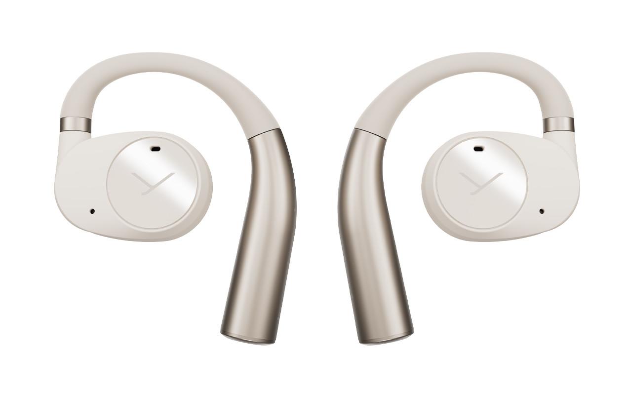 Dwa białe i srebrne bezprzewodowe słuchawki douszne, każde o zakrzywionym kształcie.
