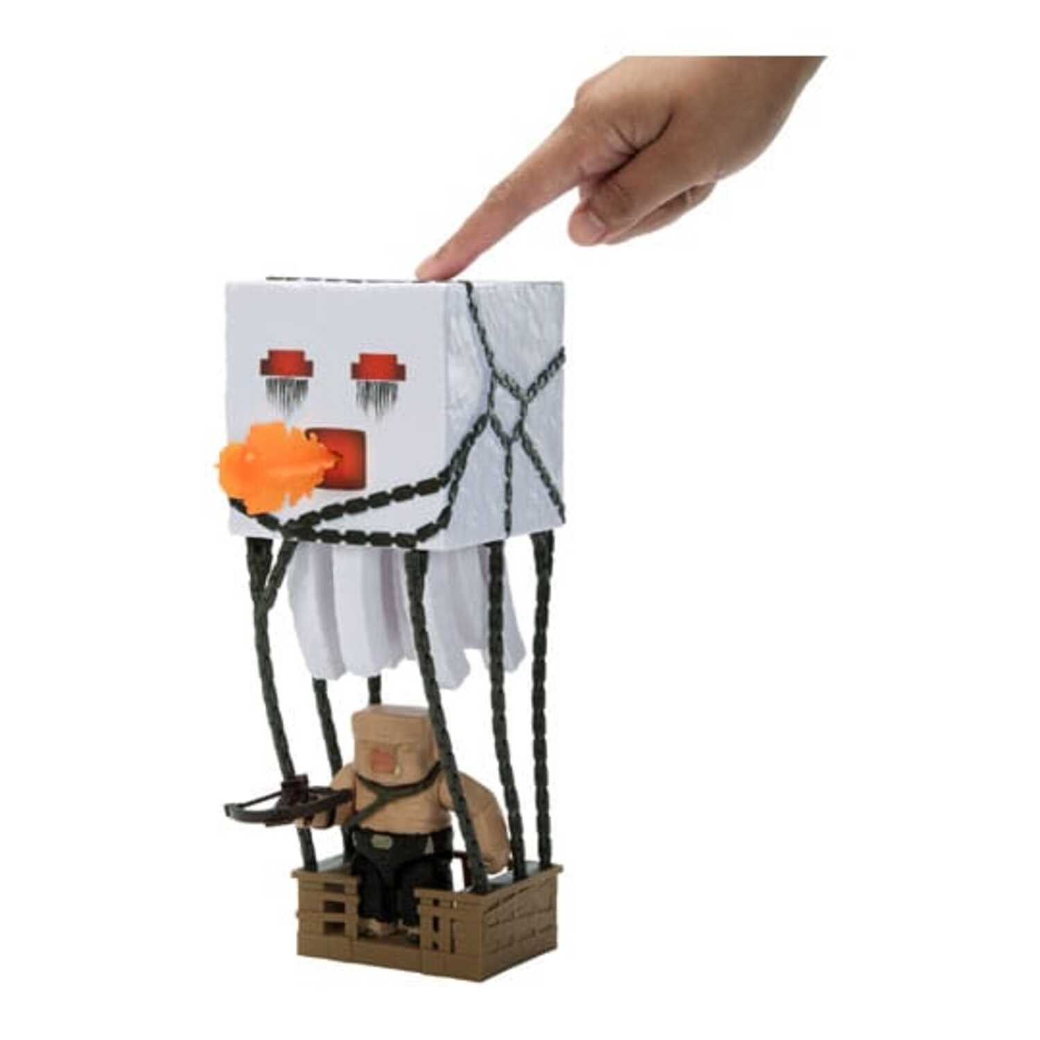 Minecraft toy in a hot air balloon, hand touching top of balloon.