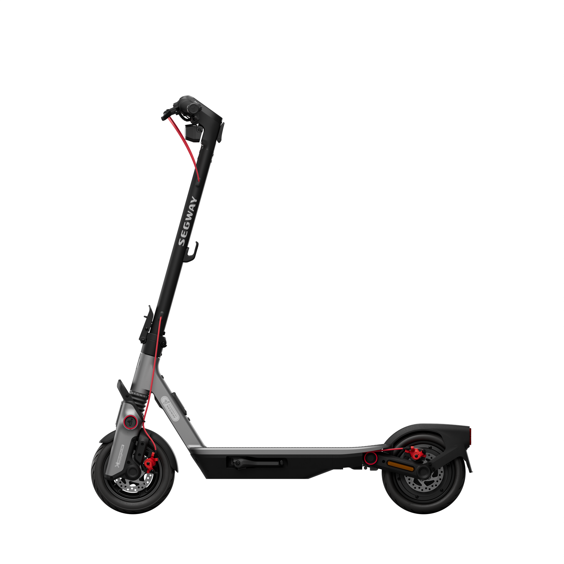 Un patinete eléctrico Segway, gris y negro, con detalles rojos, sobre fondo negro.