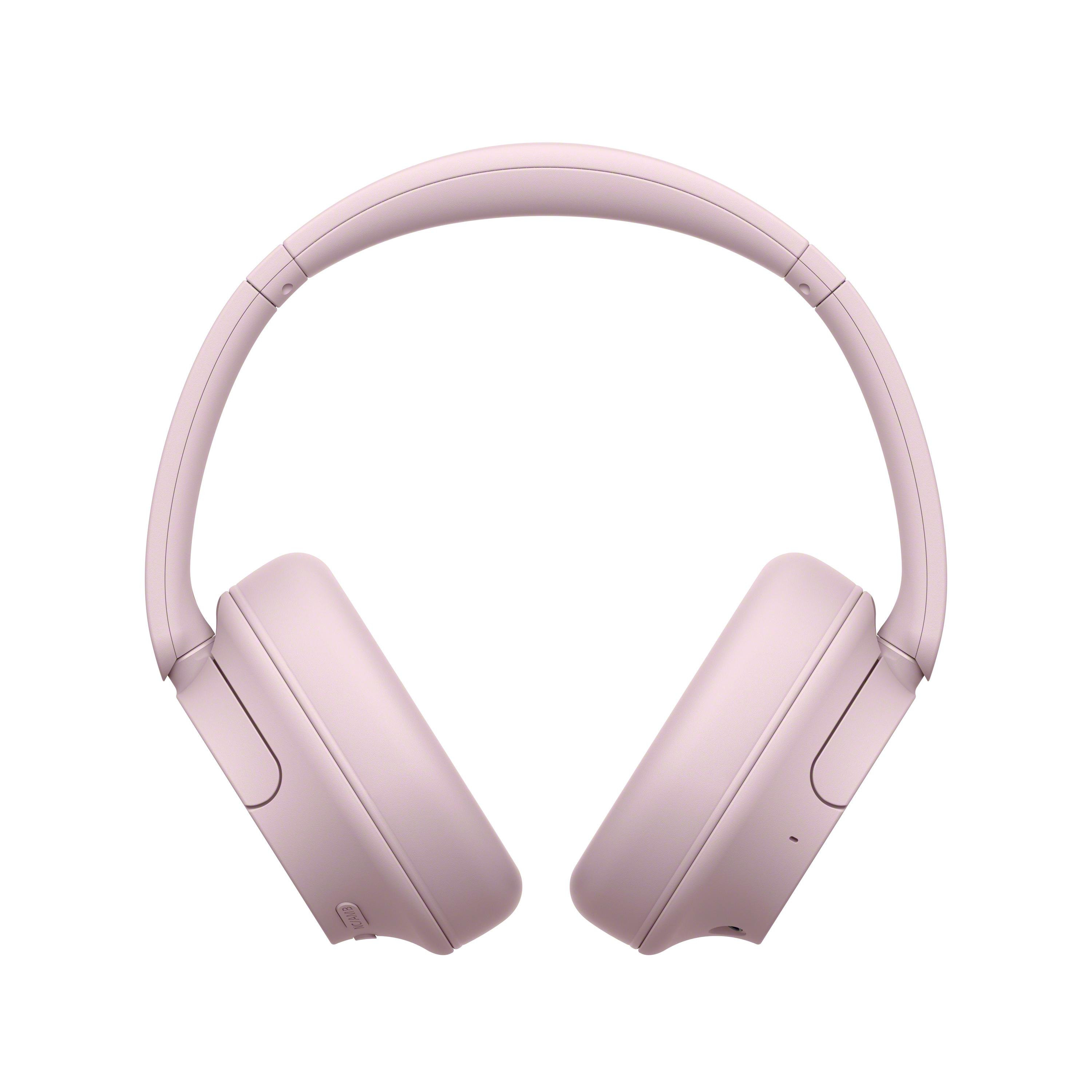 Różowe słuchawki, widok z góry. Nauszniki i pałąk są jednolite, matowe różowe.