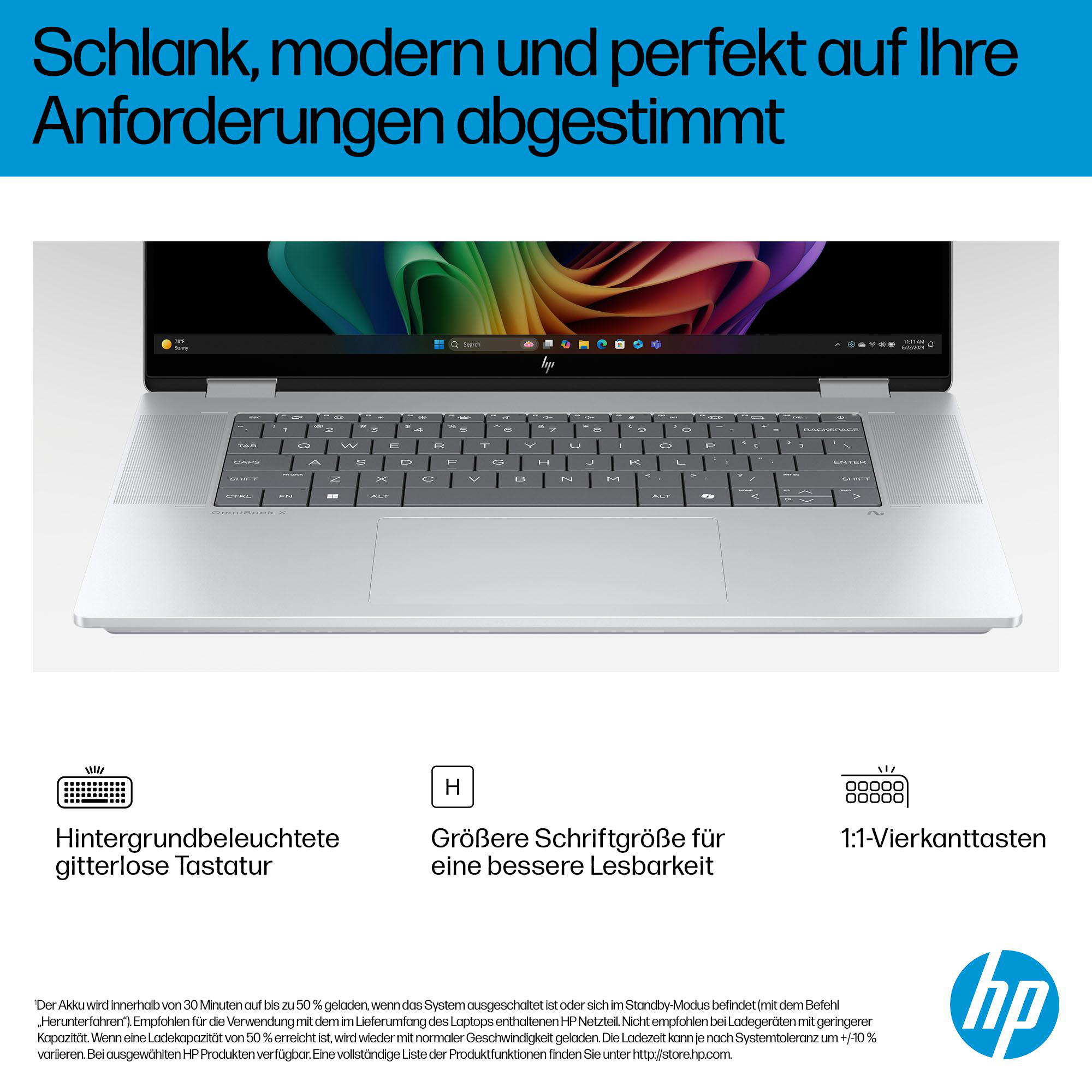Ein silberner Laptop mit hintergrundbeleuchteter Tastatur, großer Schriftart und quadratischen 1:1-Tasten.