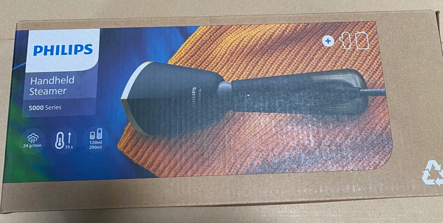 Pudełko z ręcznym parownikiem Philips, seria 5000, z ikonami, brązowe tło.