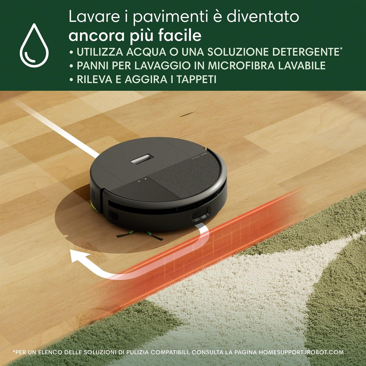 Un robot aspirapolvere sul pavimento che pulisce un tappeto. Il pavimento è in legno.
