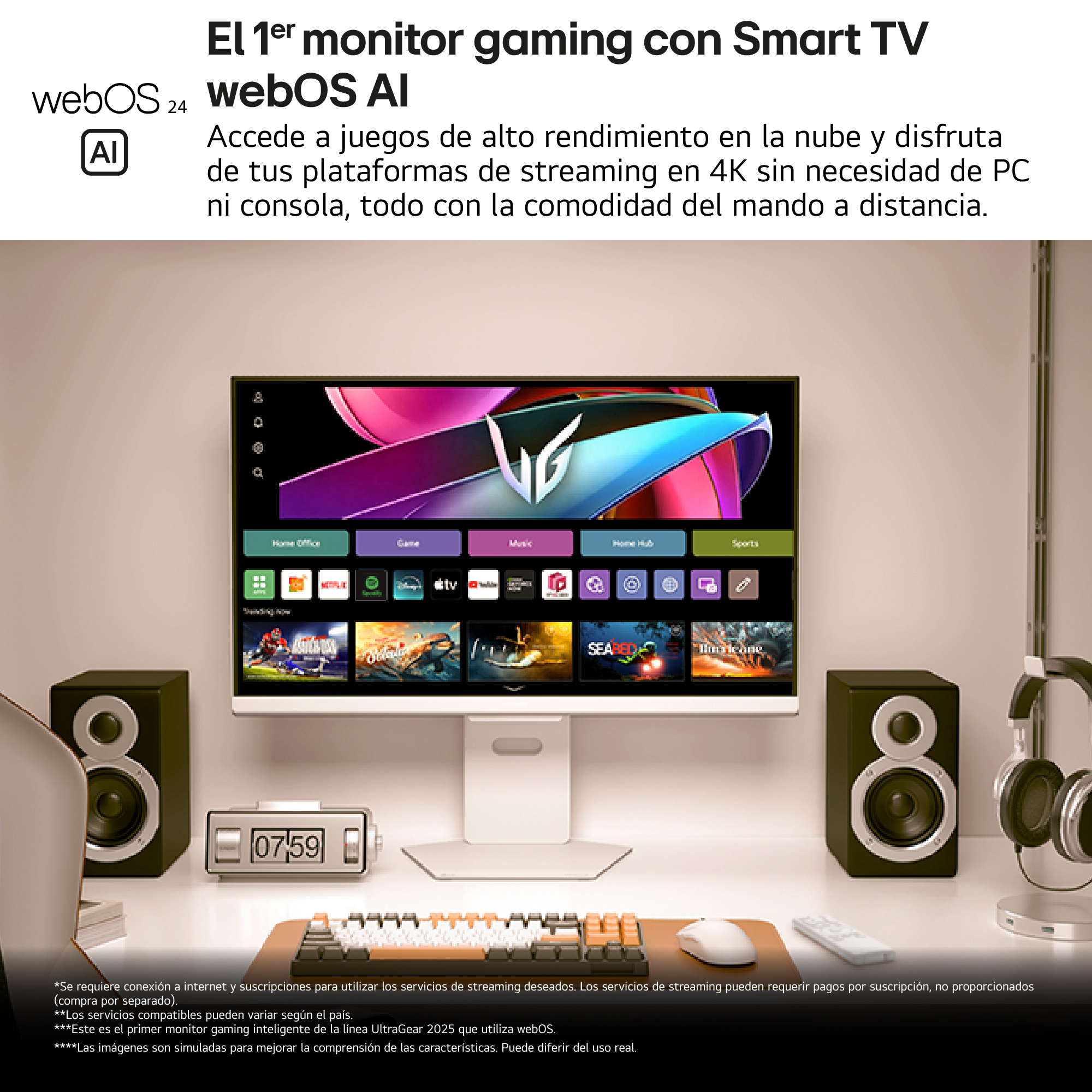 Un monitor con altavoces, teclado y auriculares.