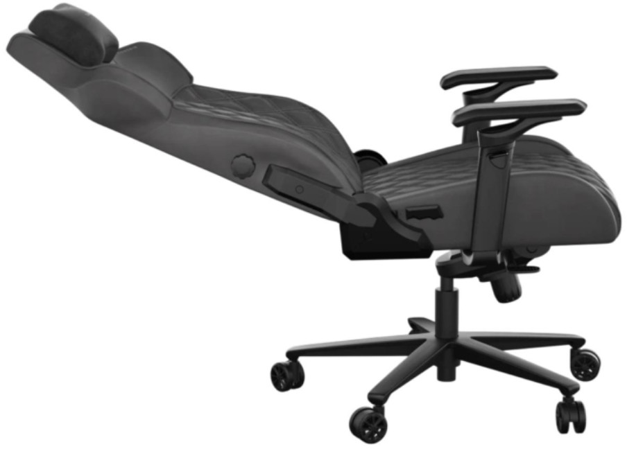 Czarny fotel do gier z zagłówkiem. Krzesło jest czarne i ma wiele regulacji.