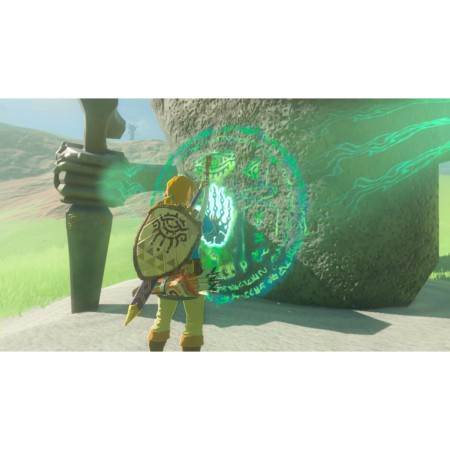 Video game character in armor facing a stone structure.
