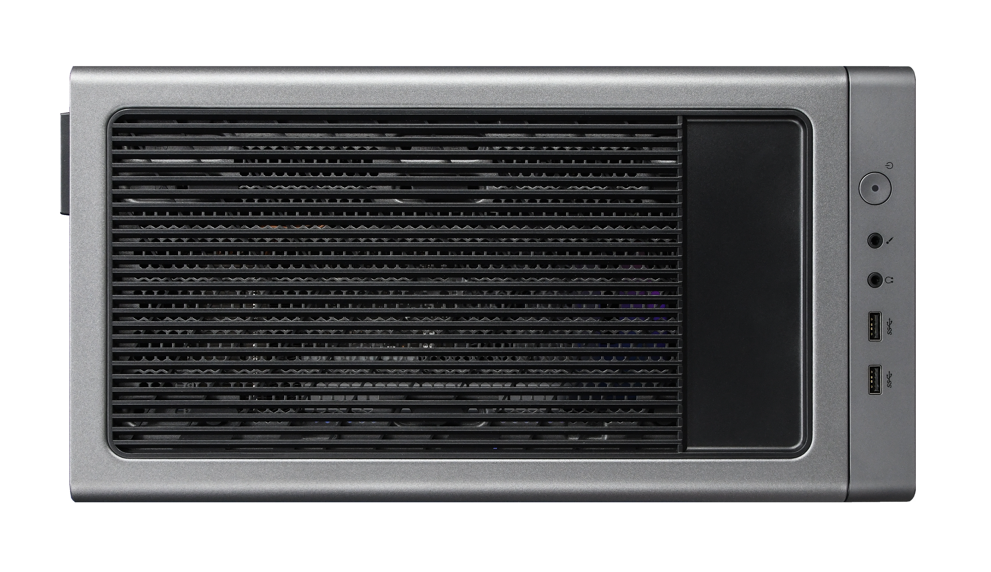 Srebrny komputer, widok z góry. Ma przedni otwór wentylacyjny, porty i przycisk zasilania z boku.