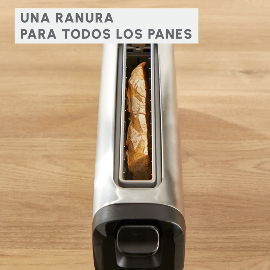 Tostadora con pan dentro. Texto: Una ranura para todos los panes.