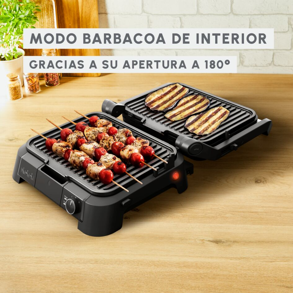 Parrilla con modo barbacoa. Texto: Modo barbacoa interior gracias a apertura 180°.