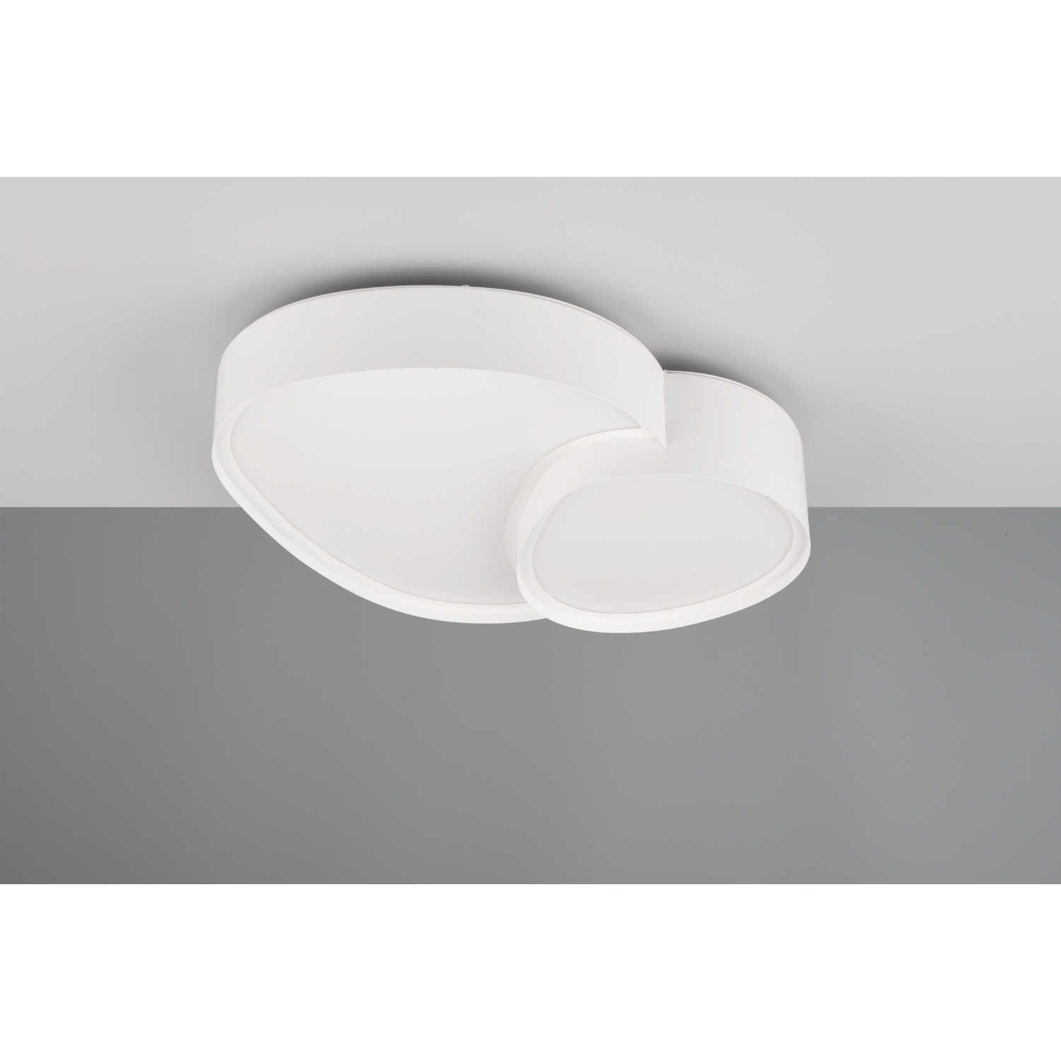 Apparecchio di illuminazione a soffitto bianco, a forma ovale, due pezzi collegati.