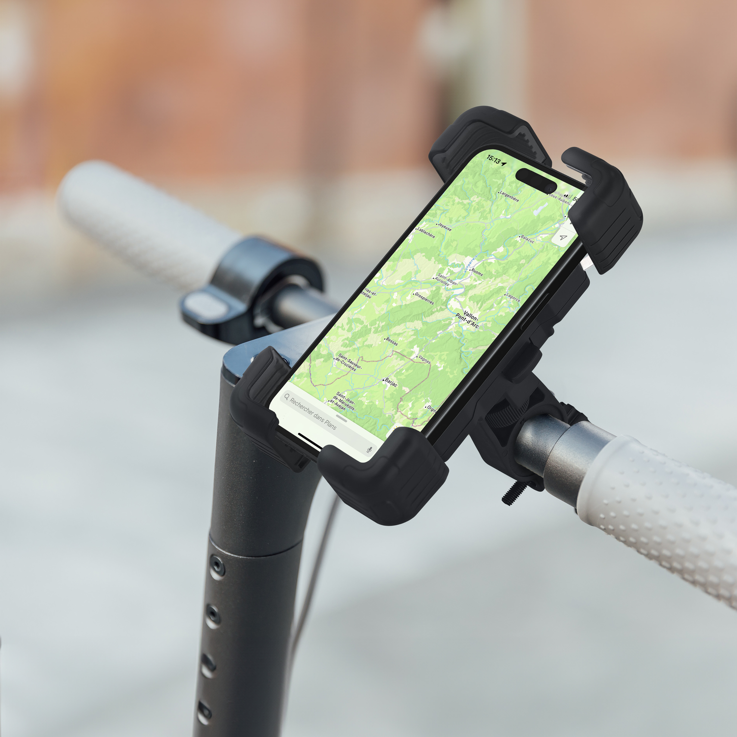 A smartphone mounted on a scooter's handlebars, displaying a map application.