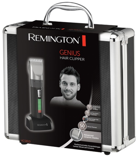 Trymer Remington Genius w srebrnej walizce, z twarzą mężczyzny.