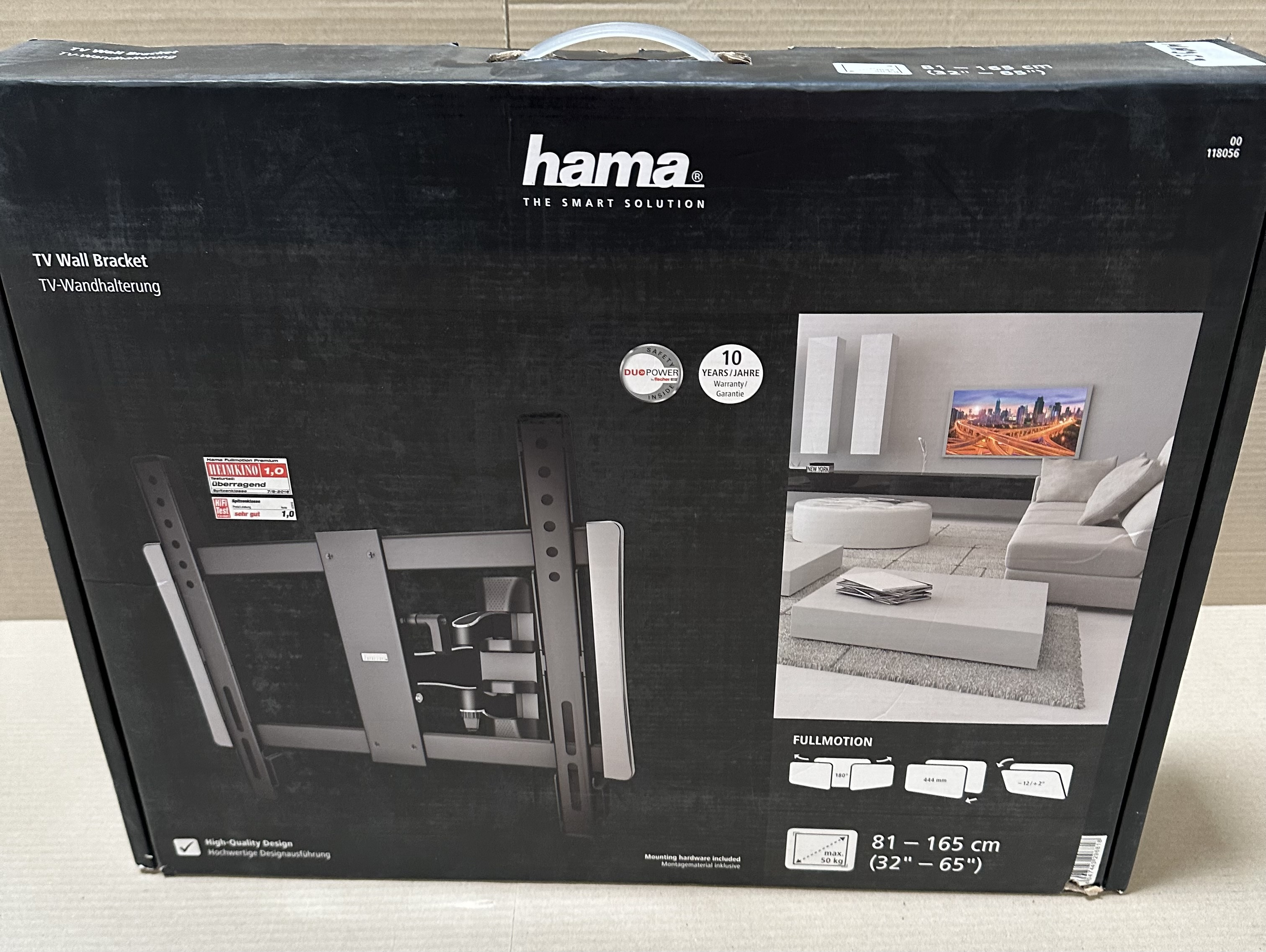 Czarne pudełko z obrazem uchwytu ściennego do TV, opisem produktu i logo Hama.