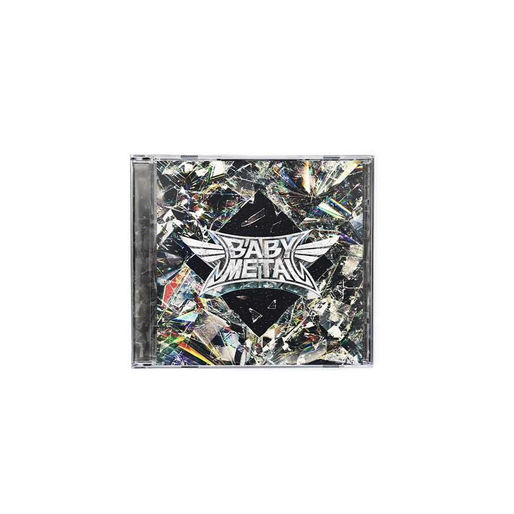 CD-Hülle mit zerrissenem, abstraktem Hintergrund. Das Logo "BABY METAL" ist zentriert. Die Hülle liegt auf einer weißen Oberfläche.
