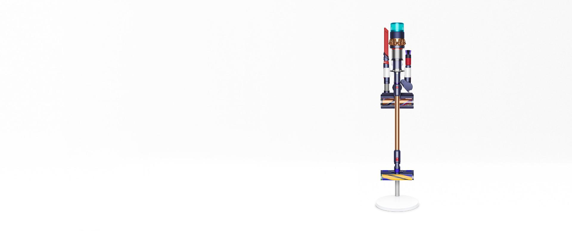 Beyaz bir arka plan üzerinde bir stand üzerinde bir Dyson elektrikli süpürgesi. Elektrikli süpürge demonte edilmiş.