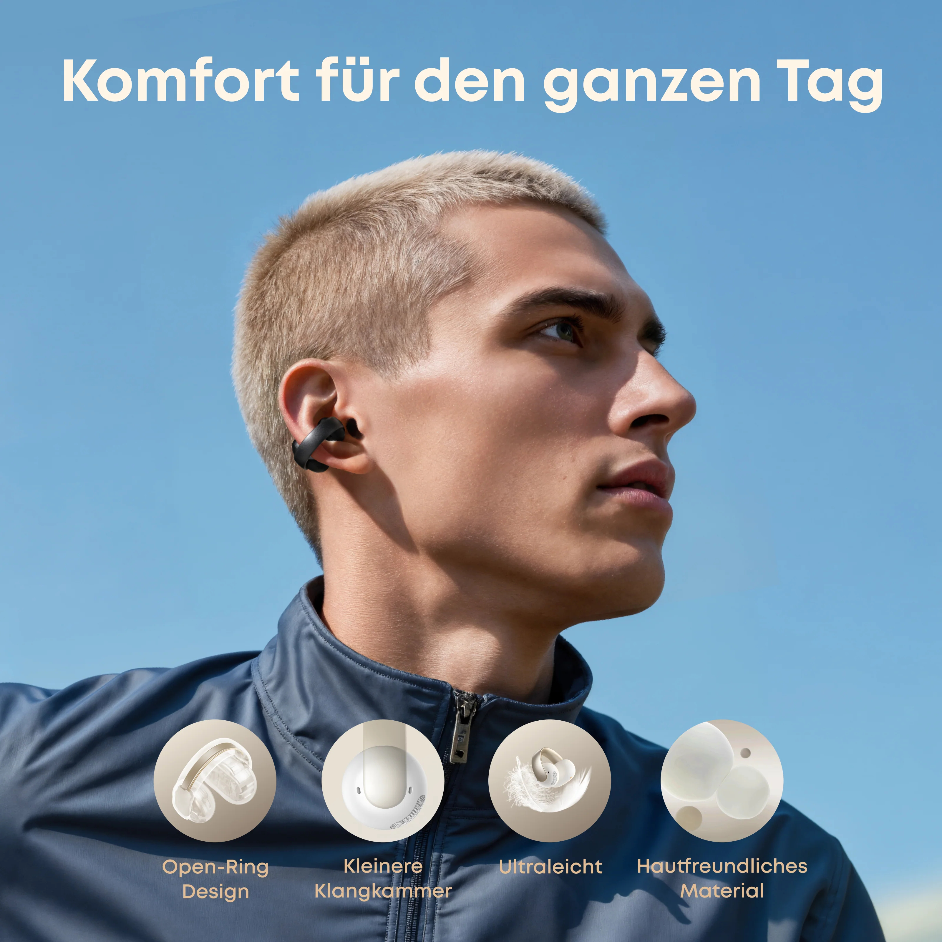 Mann mit Ohrhörern. Nahaufnahme des Ohrhörer-Designs mit Beschreibungen. Blauer Himmel im Hintergrund.
