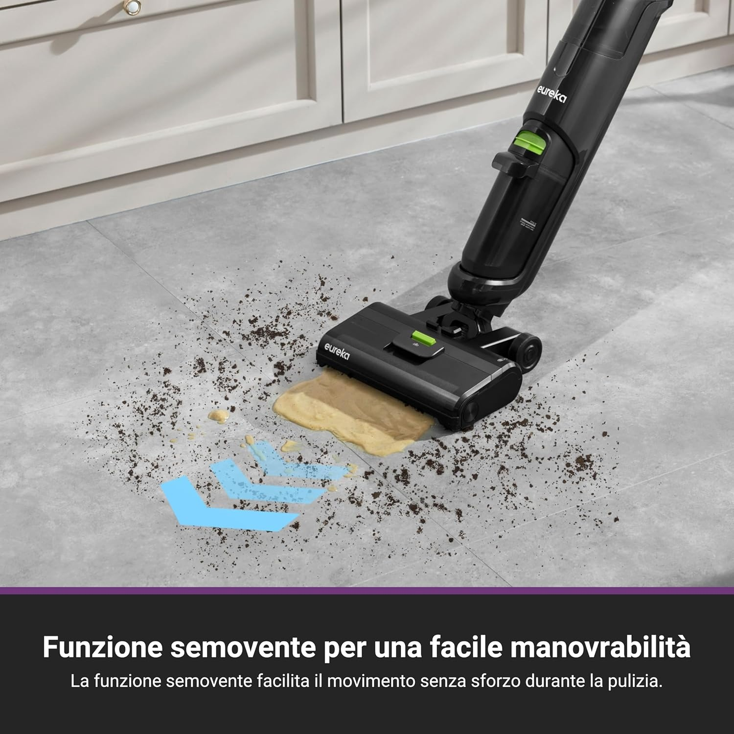 Aspirapolvere Eureka nero che pulisce un pavimento in piastrelle grigie. Sporco e percorso di pulizia.