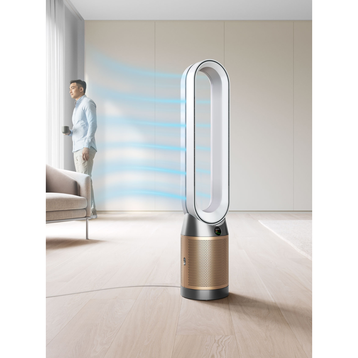 Man looking out of window near air purifier.