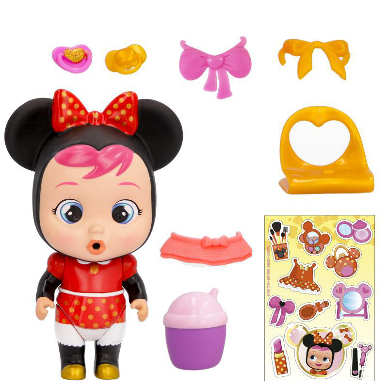 Eine Minnie-Maus-Puppe mit Zubehör. Enthält Schnuller, Schleifen, einen Rock und einen Aufkleberbogen mit Minnie-Maus-Bildern und anderen Artikeln.