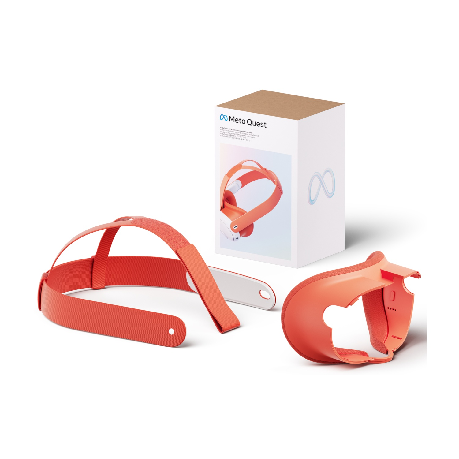 Componenti e scatola delle cuffie VR Meta Quest arancioni su una superficie bianca.